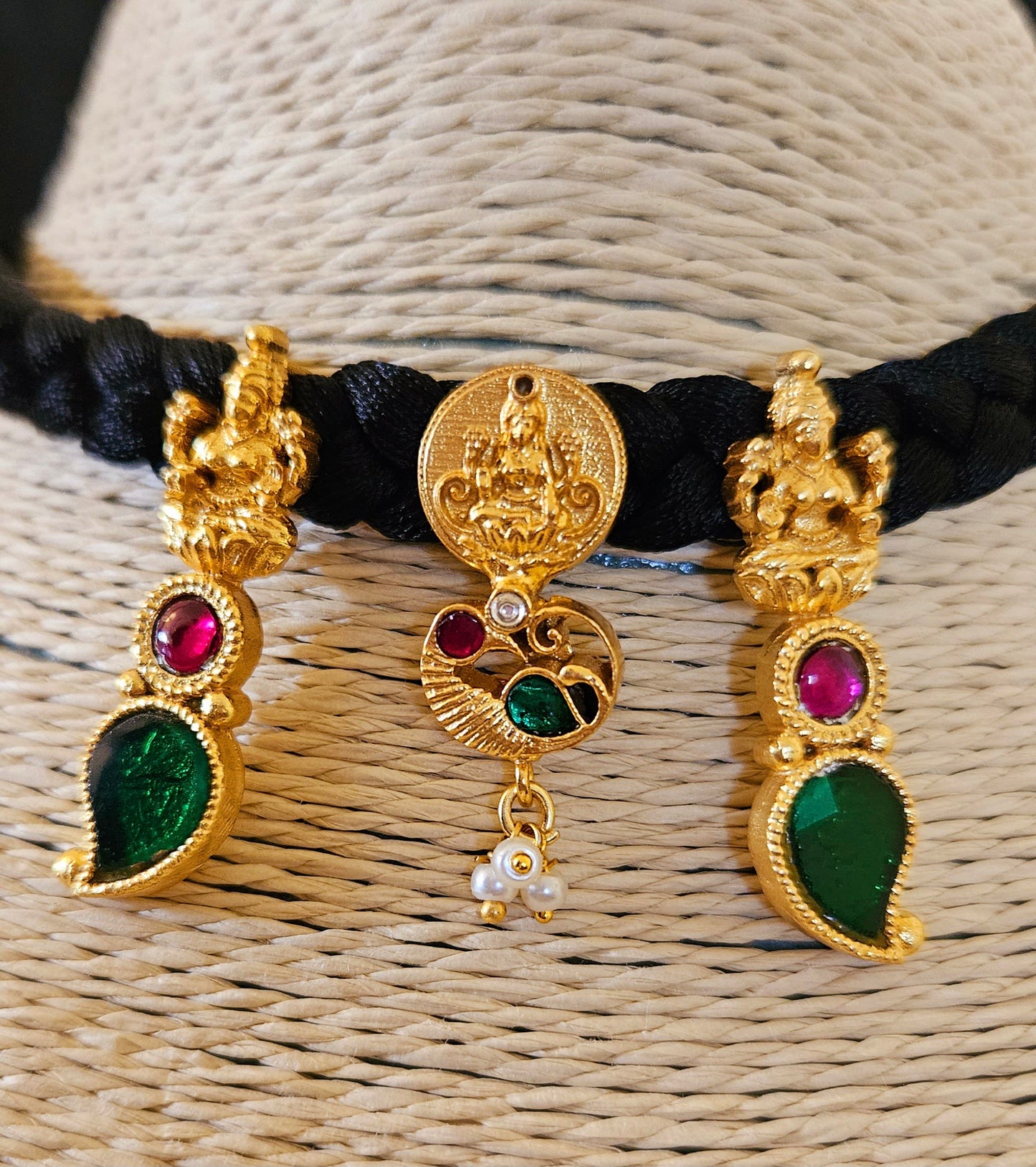 Choker (necklace) with three Lakshmi tikdas on black string