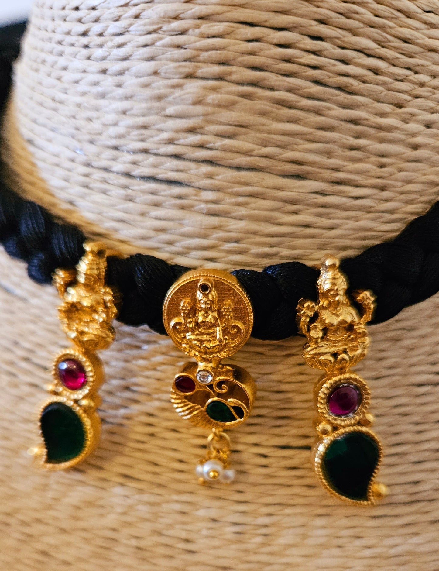 Choker (necklace) with three Lakshmi tikdas on black string