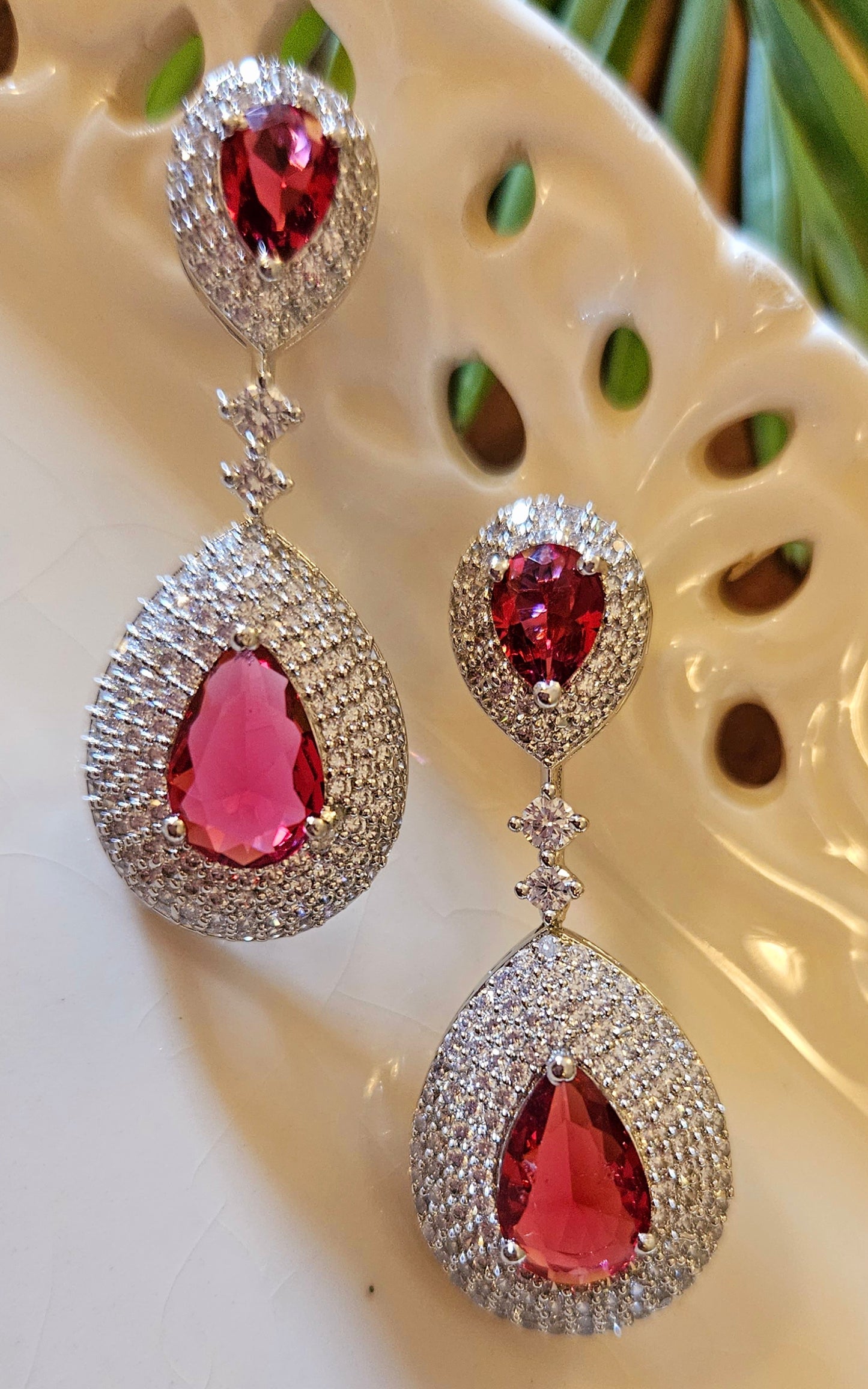 Platinum finish ruby set, teardrop themed multi-layered big necklace in ruby in CZ, matching earrings