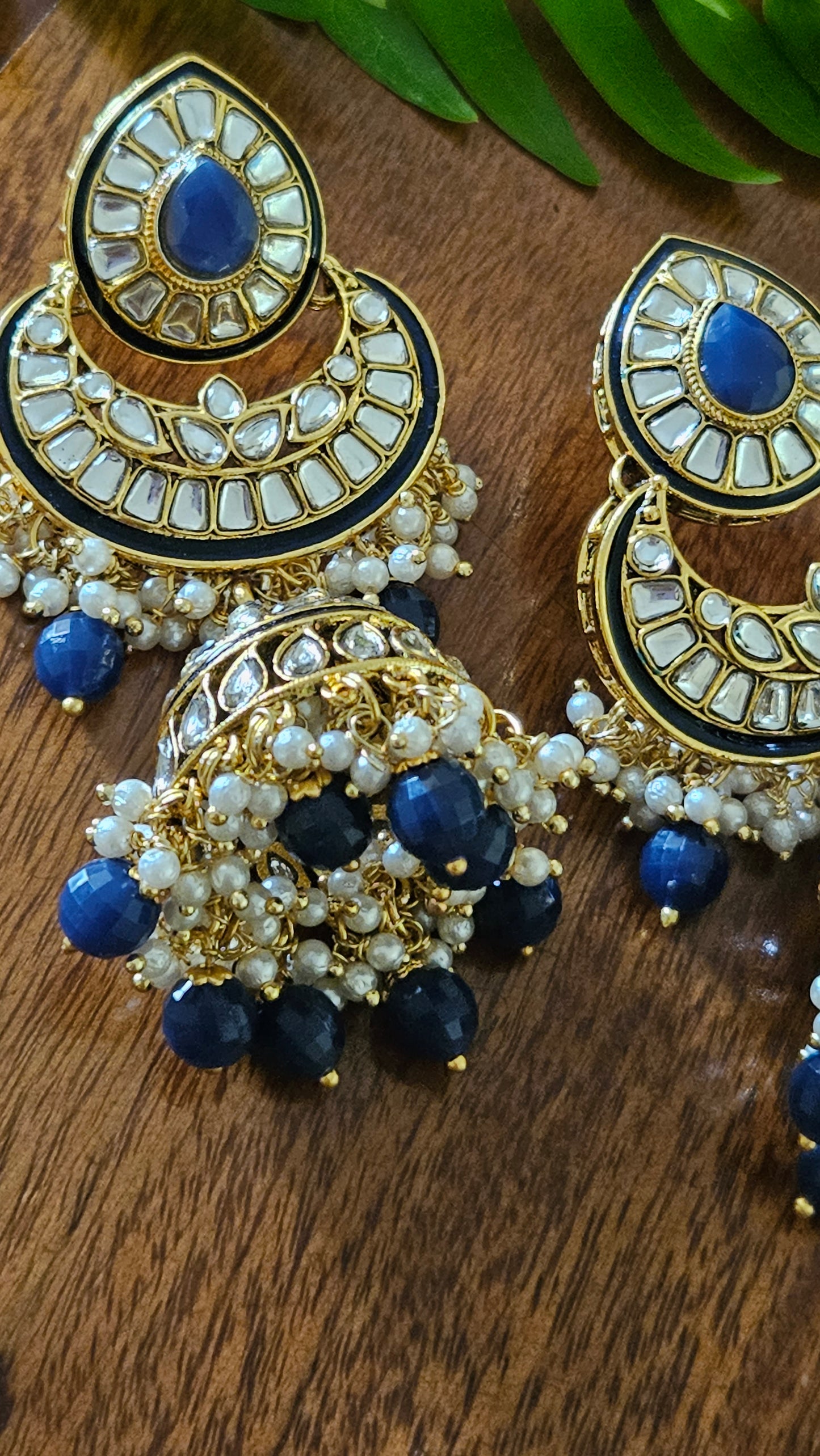 Gold finish big kundan jhumka (earrings), chaandbali with blue stone and kundan work