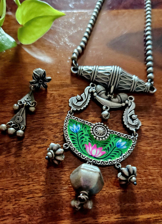 Silver finish long necklace set, green hand-painted pendant with metal globe hanging and damroo held on metal bead chain, matching earrings