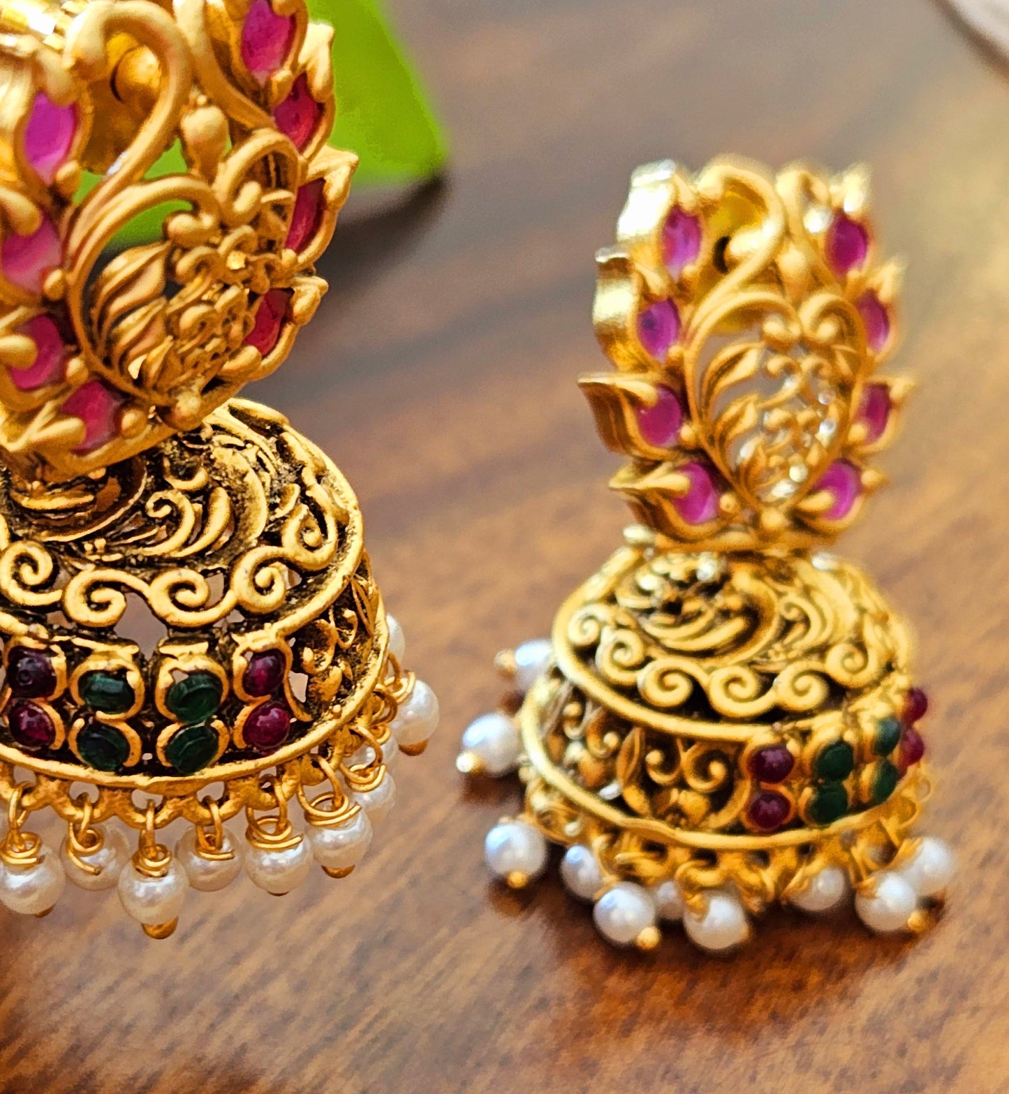 Temple jewelry set in matt gold finish necklace with krishna pendant with intricate carving, matching jhumka (earrings)