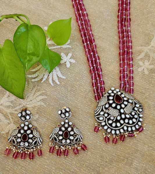 Antique finish set, pink stone long necklace with parrot-elephant design pendant,matching earrings