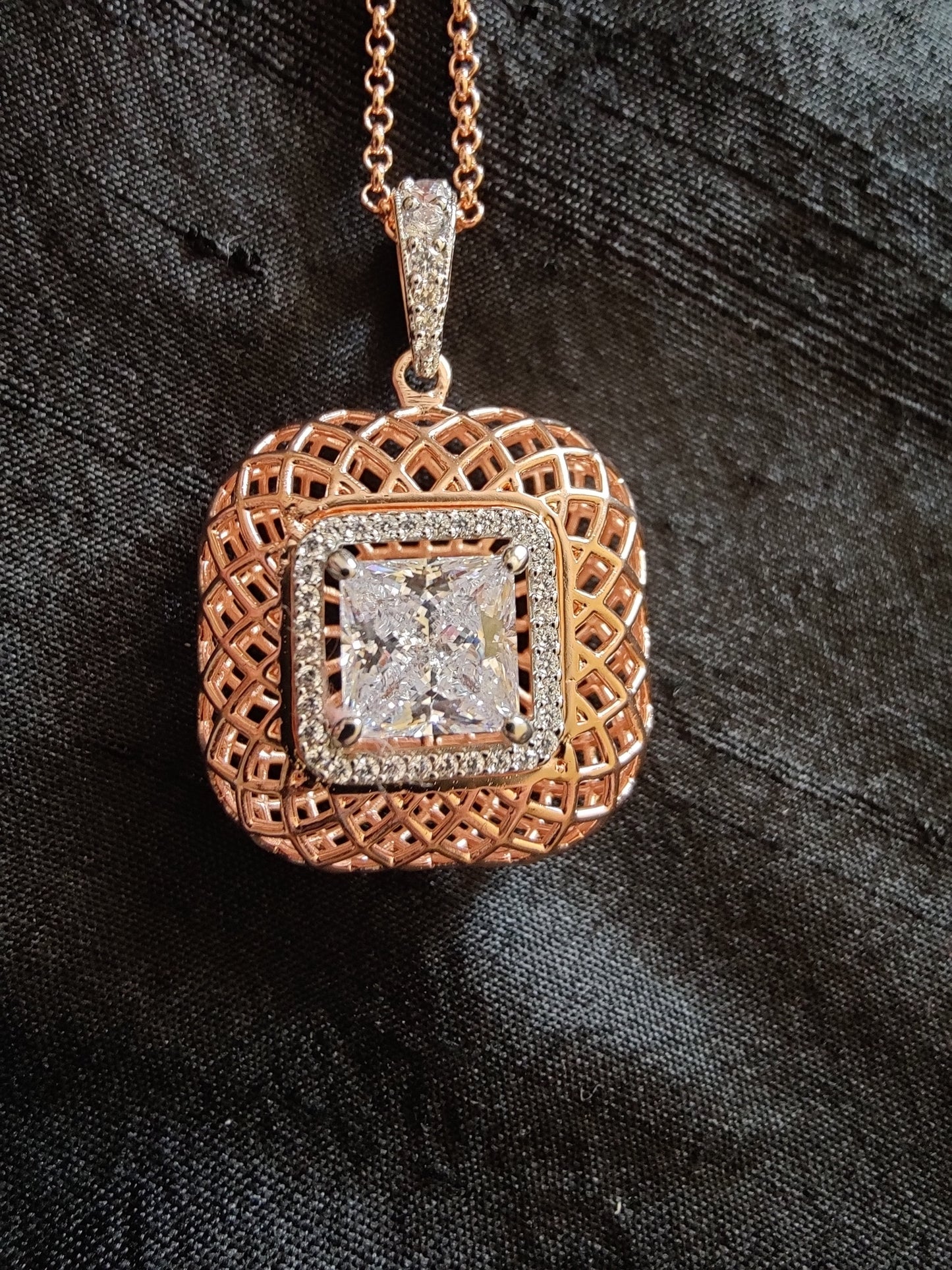 Elegant rose gold pendant and earrings set