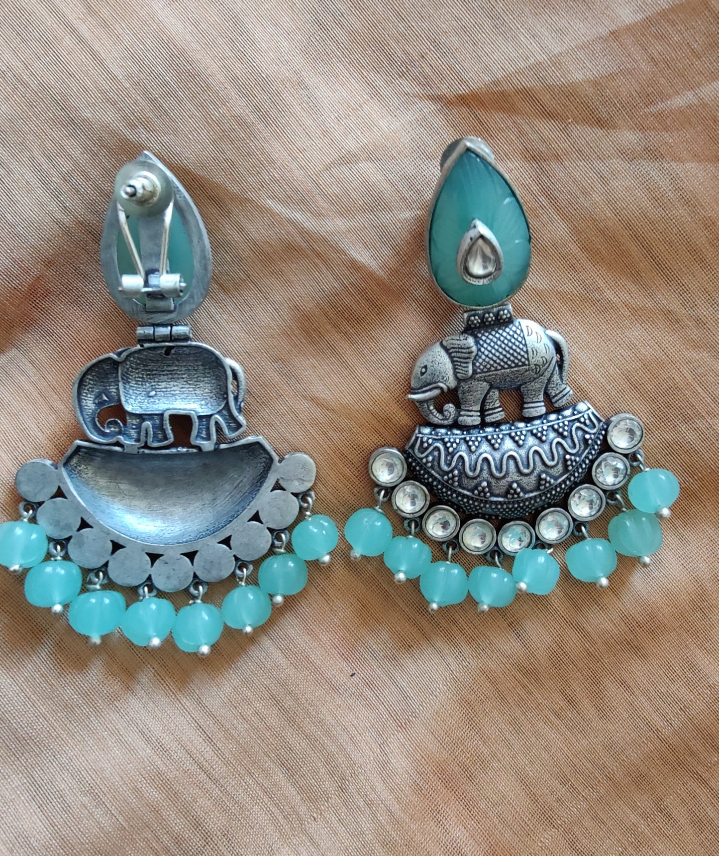 Statement earrings with elephant motif in silver finish