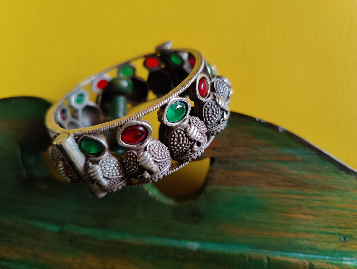 Silver finish bangle in peacock design, emerald and ruby stone work (1 pc)