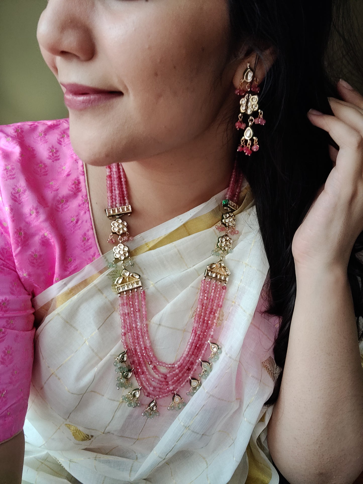 'Roseate' multi-strand necklace set in delicate pink beads and kundan, with matching earrings