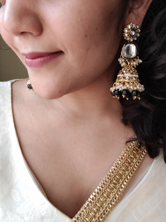 Gold finish big jhumka (earrings) with big kundan stone, kundan work with blue beads finishing