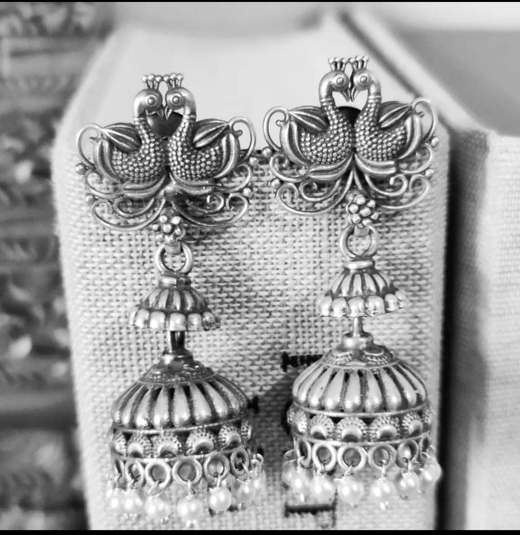 Silver peacock pair jhumkas (earrings) with pearls